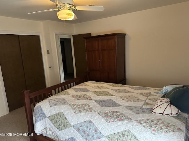 carpeted bedroom featuring a closet and ceiling fan