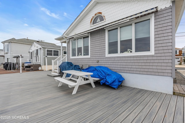 wooden terrace with grilling area