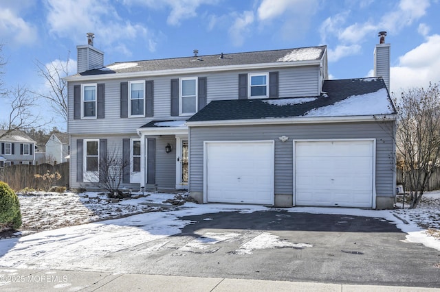 front facade with a garage