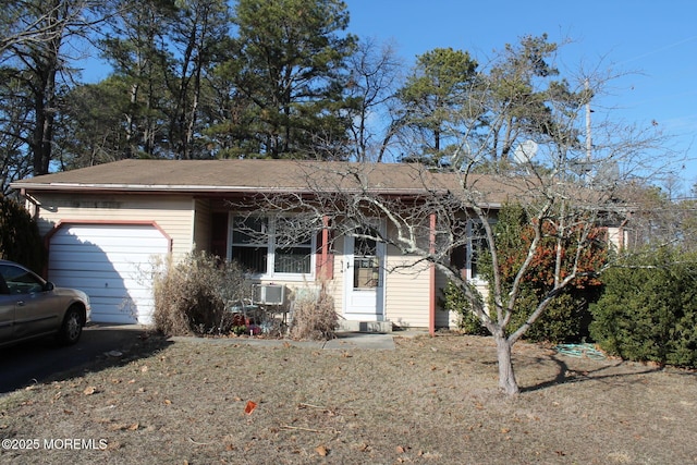 single story home with a garage