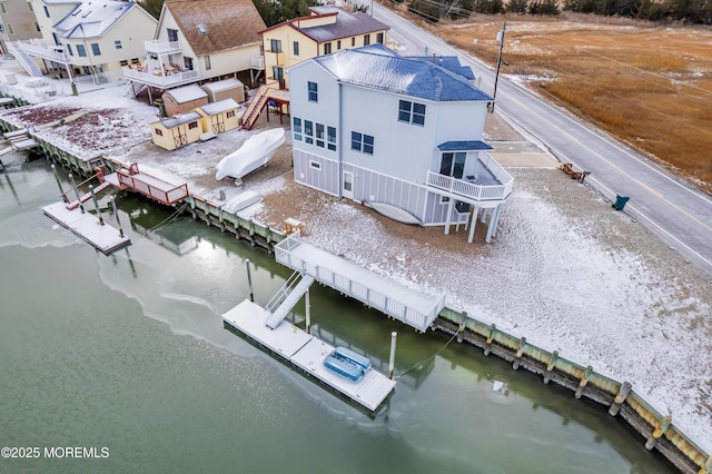 drone / aerial view featuring a water view