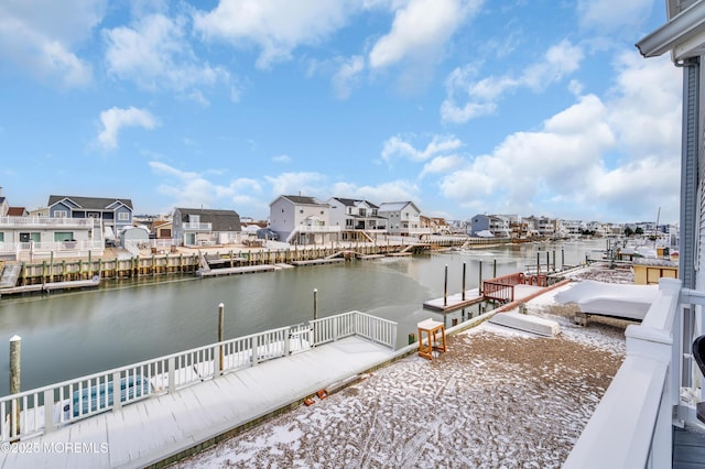 dock area with a water view