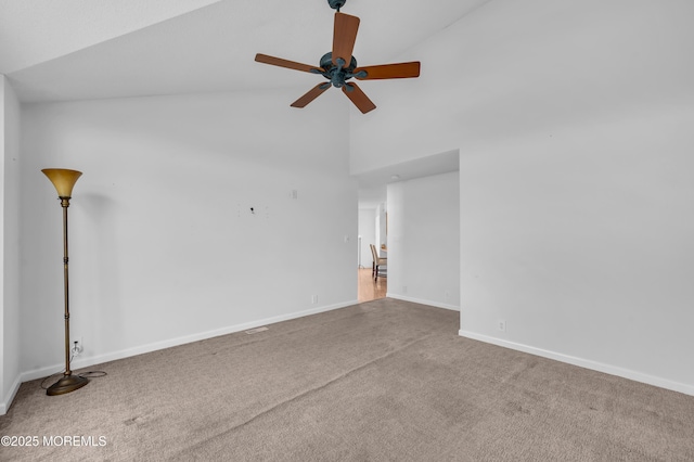 unfurnished living room with carpet flooring, high vaulted ceiling, and ceiling fan