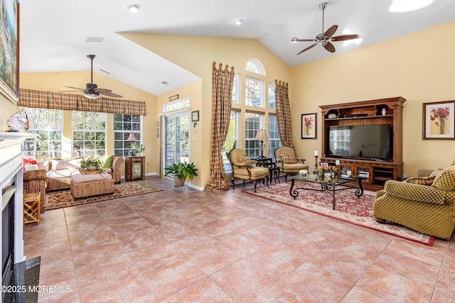 living room with ceiling fan, light tile patterned floors, and high vaulted ceiling