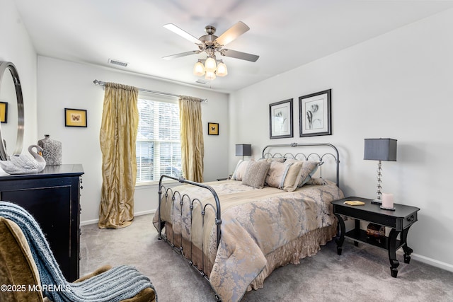 bedroom featuring ceiling fan and light colored carpet