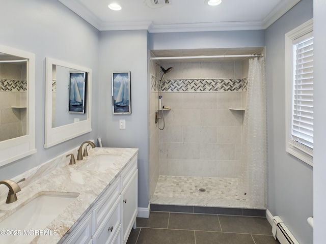 bathroom with crown molding, baseboard heating, vanity, curtained shower, and tile patterned flooring