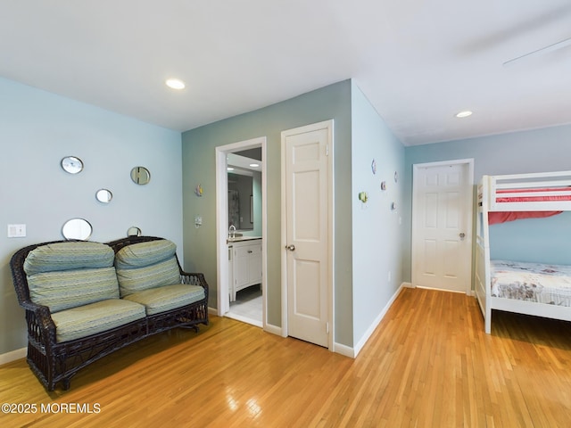 sitting room with light hardwood / wood-style flooring