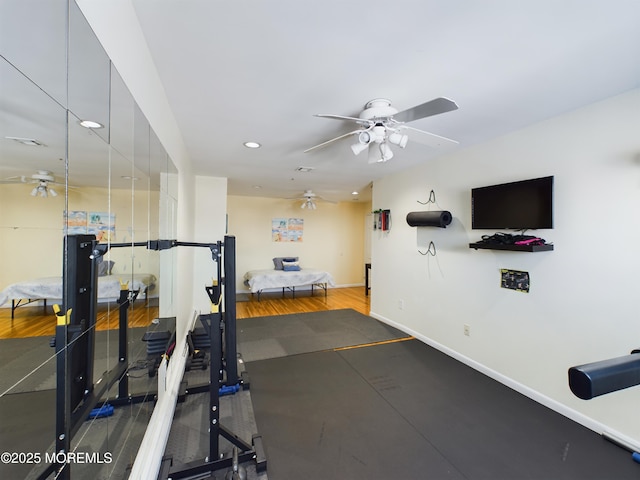 workout room featuring ceiling fan