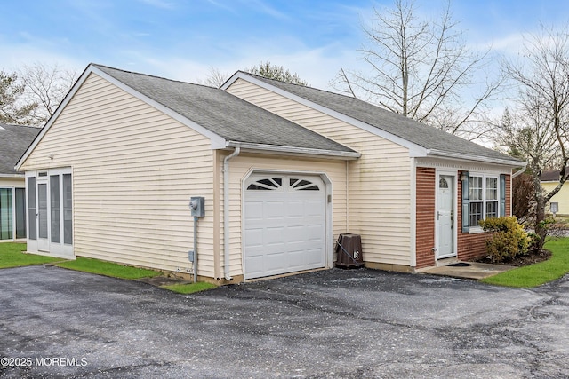 view of home's exterior featuring a garage