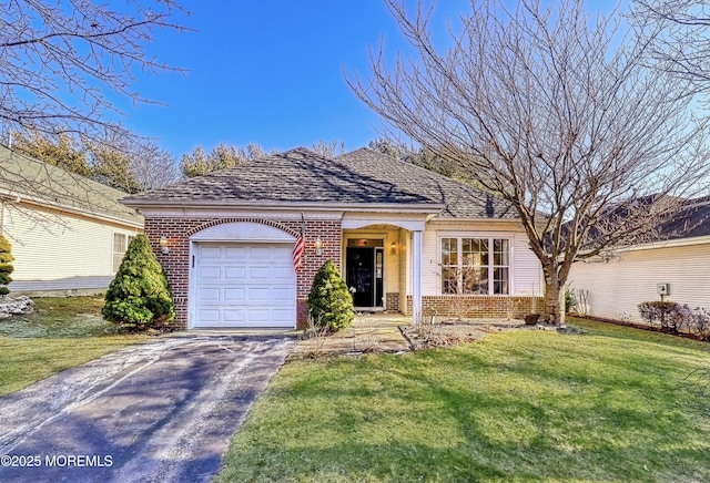 ranch-style house with a front yard and a garage