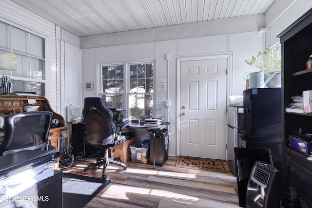 office with hardwood / wood-style flooring