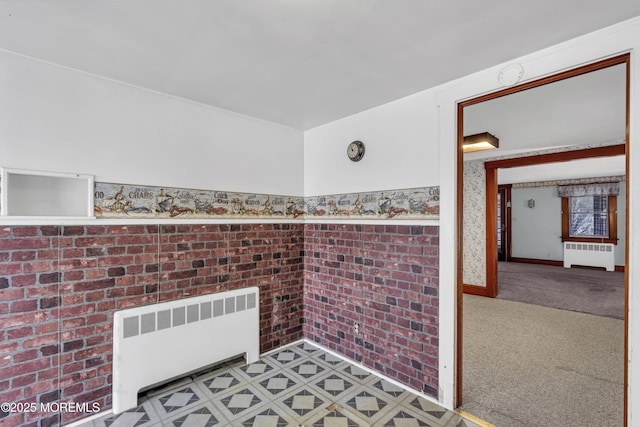 bathroom with radiator heating unit