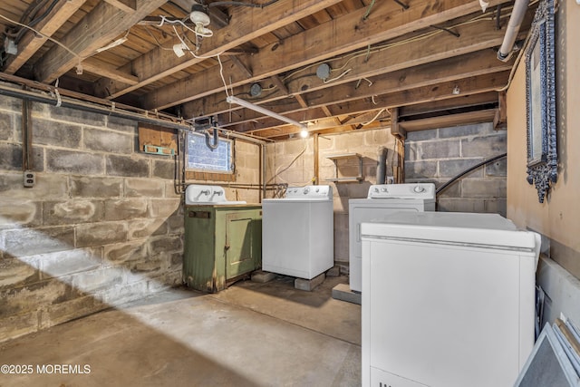 interior space featuring washer and clothes dryer and fridge