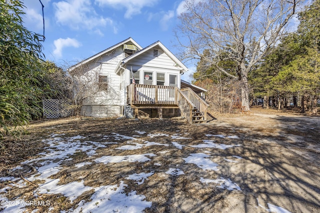 view of front of property with a deck