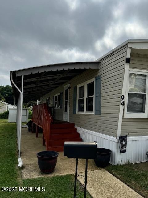 view of home's exterior with a yard