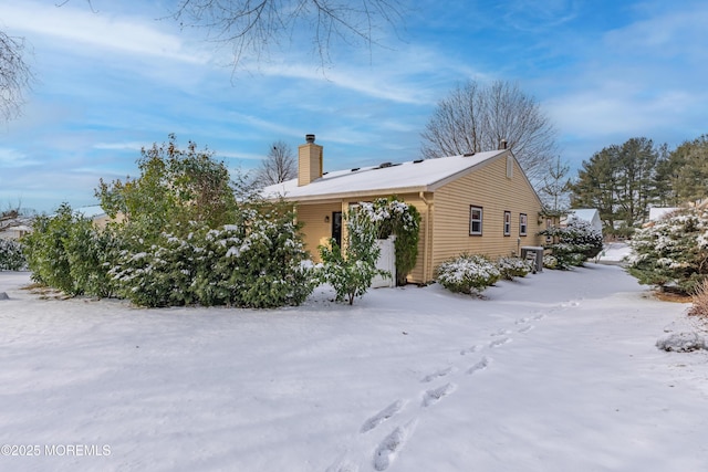 view of snow covered property