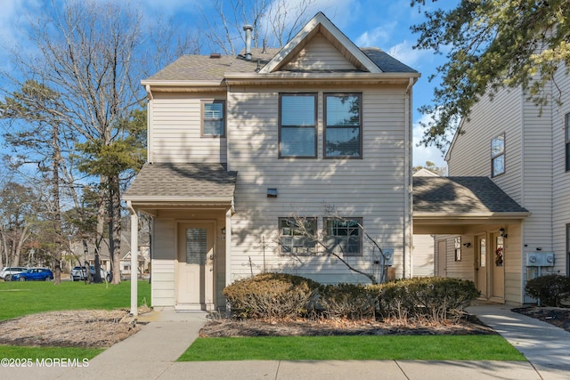 view of front of house with a front lawn