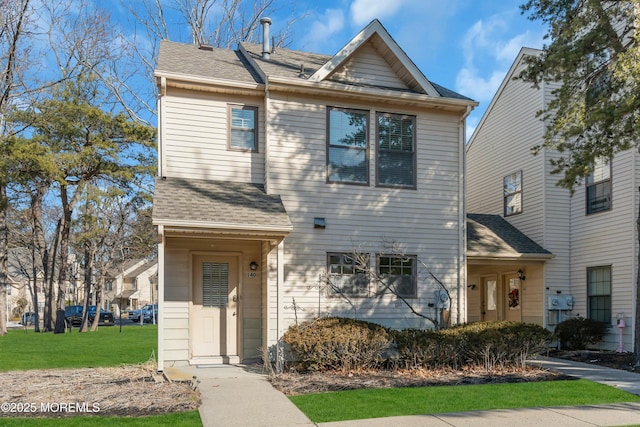 view of front of home with a front lawn