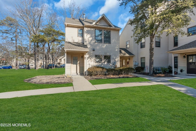 view of front facade with a front yard