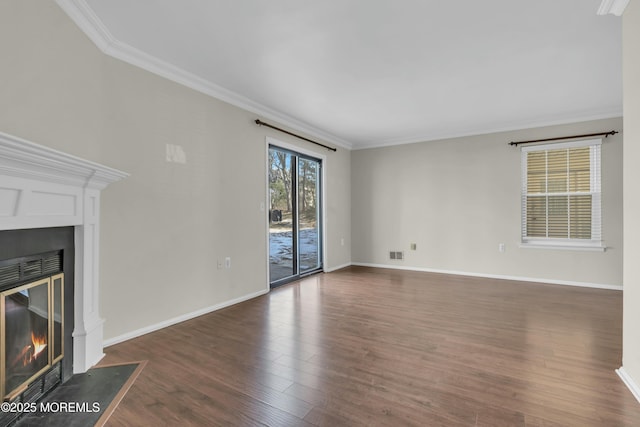 unfurnished living room featuring crown molding and dark wood-type flooring