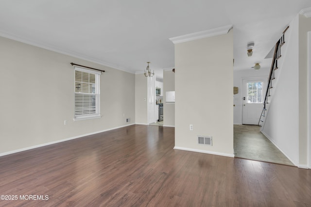 unfurnished living room with a chandelier, ornamental molding, and dark hardwood / wood-style flooring