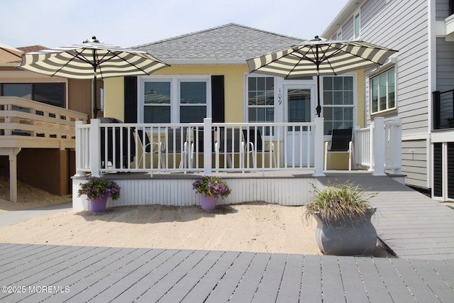 rear view of house with a deck