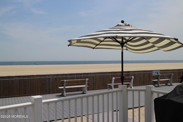 property view of water featuring a beach view