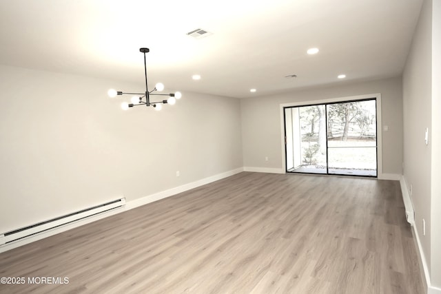 unfurnished room featuring light wood-type flooring, a baseboard radiator, and an inviting chandelier