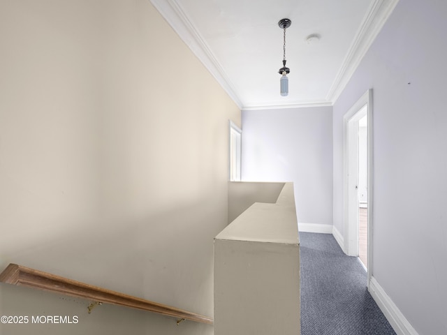 hall with carpet flooring and crown molding