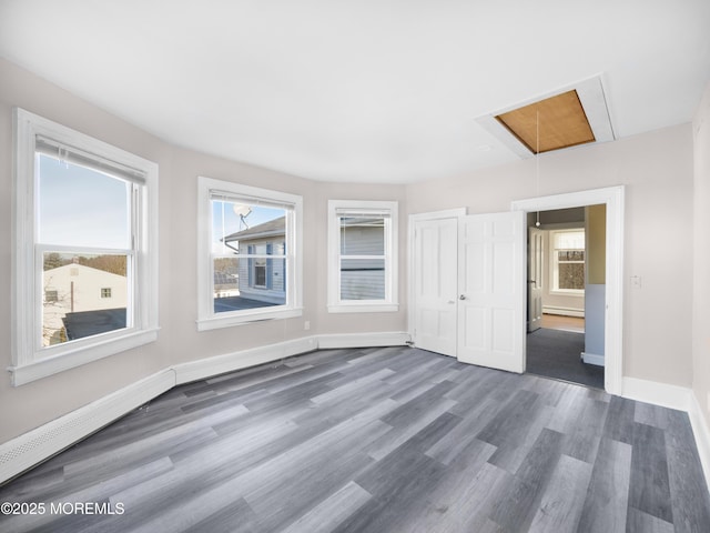 empty room with dark wood-type flooring