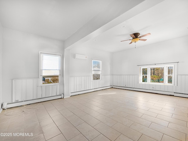 unfurnished living room featuring baseboard heating, a wealth of natural light, and a wall mounted air conditioner