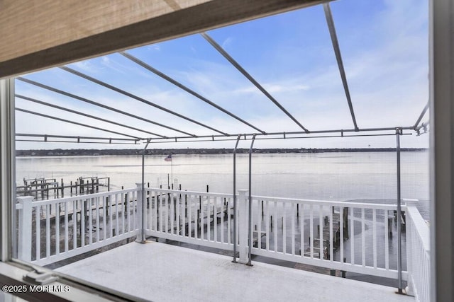 view of patio featuring a water view