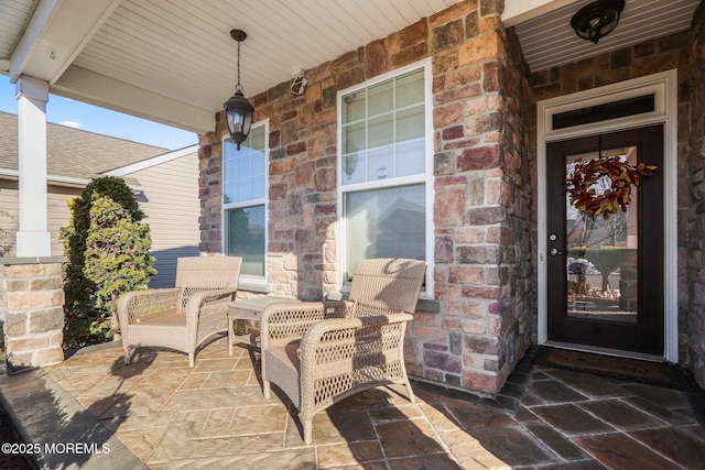 entrance to property featuring a porch