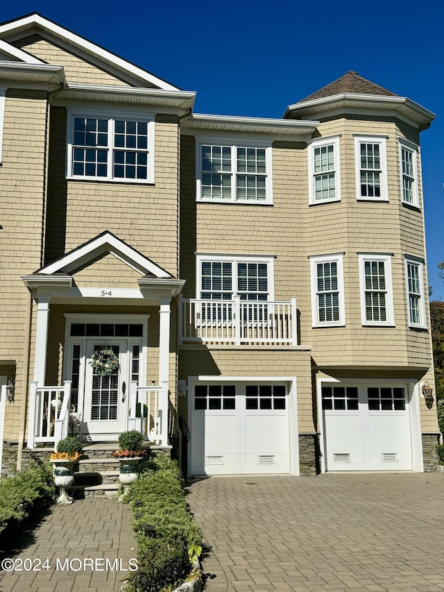 view of front of property featuring a garage