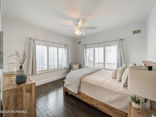 bedroom with ceiling fan, dark wood-type flooring, and crown molding