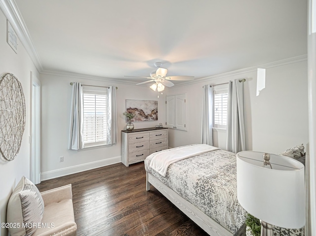 bedroom with ceiling fan, crown molding, and dark hardwood / wood-style floors