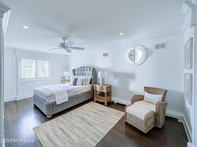 bedroom featuring ceiling fan, dark wood-type flooring, and ornamental molding