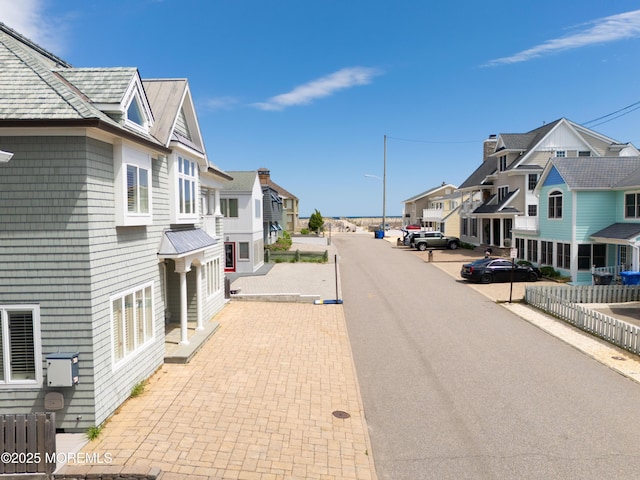 26 N Surf Rd, Lavallette, NJ 08735 - view of asphalt road featuring a residential view and street lighting