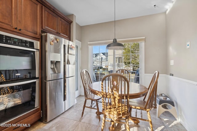 dining room featuring light tile patterned floors