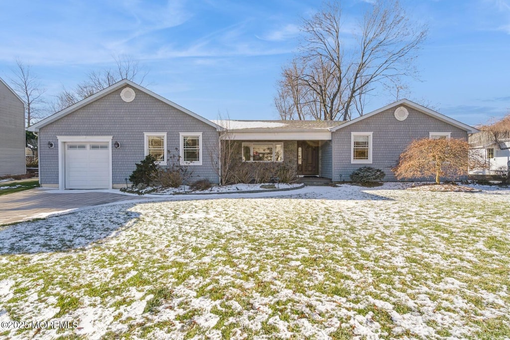 ranch-style home with a garage