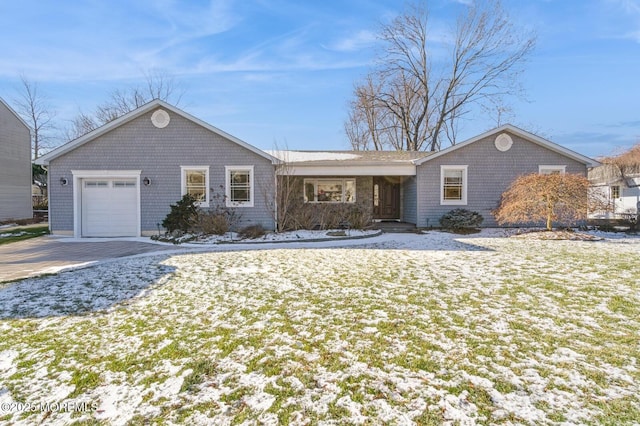 ranch-style home with a garage