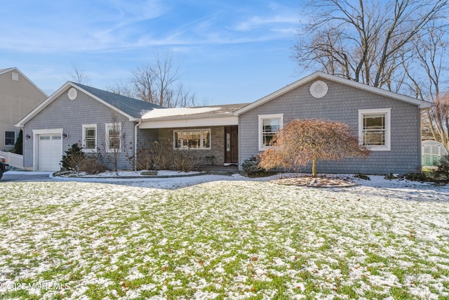 ranch-style home with a garage