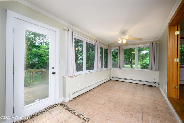 unfurnished sunroom with ceiling fan and a baseboard radiator