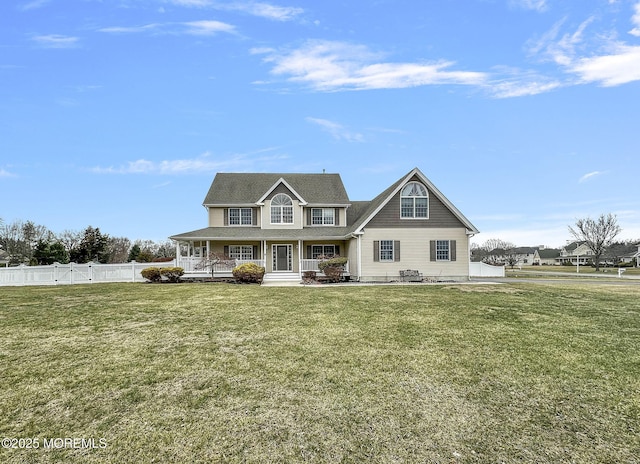 view of front facade featuring covered porch and a front lawn