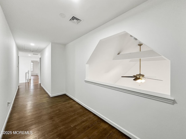 hallway with dark wood-type flooring