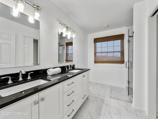 bathroom with vanity and a shower with shower door