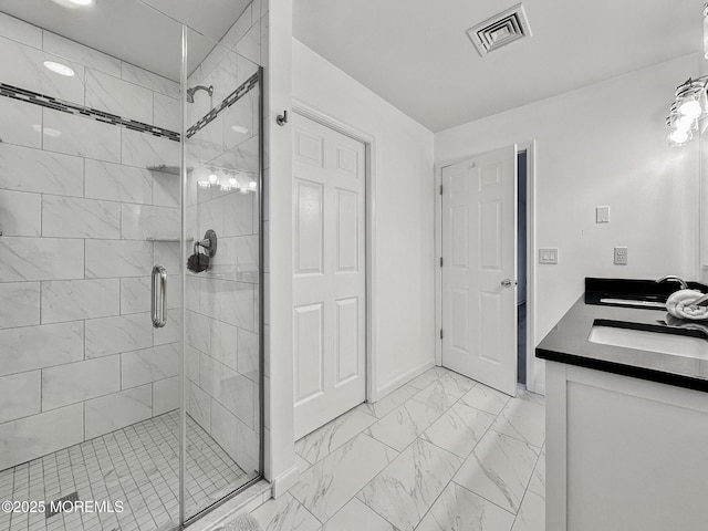 bathroom with vanity and walk in shower