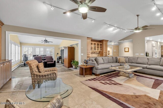 living room featuring lofted ceiling and ceiling fan