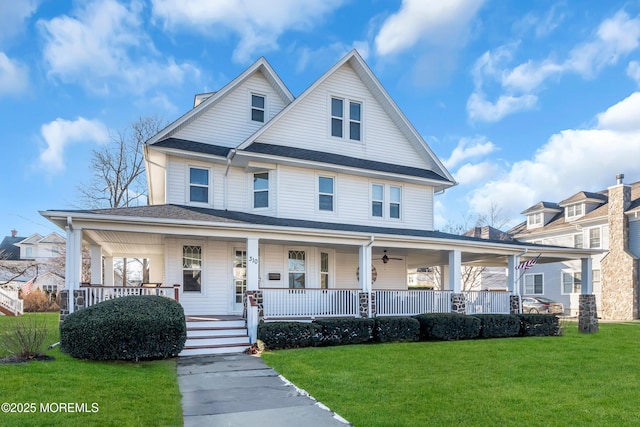 view of front facade with a front lawn and a porch