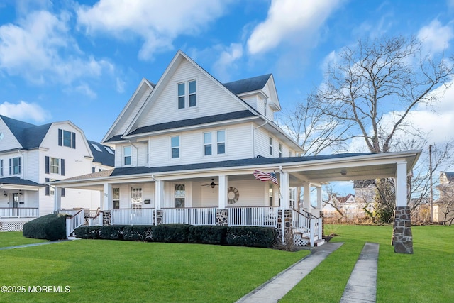 view of front of home featuring covered porch and a front yard